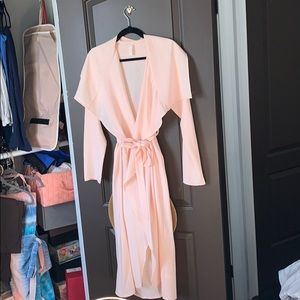 Woman’s pink duster
